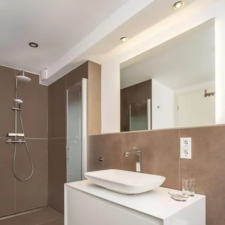 Апартаменты Moderne Stilvolle Im Herzen Muenchens Мюнхен